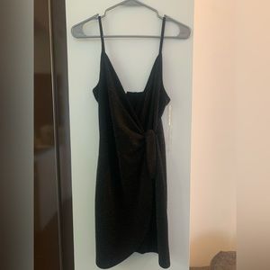Cute little black wrap dress, subtle sparkles!